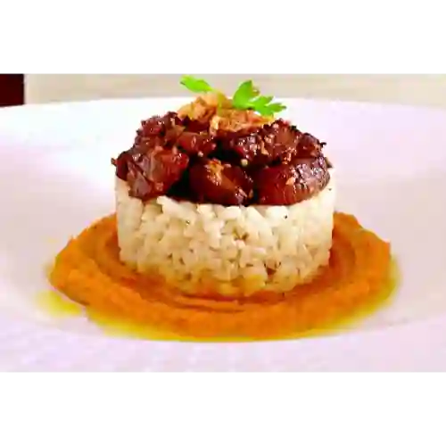 Timbal de Arroz y Lomo en Miel Mostaza