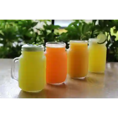 Jugo en Agua de Mango 16 Oz