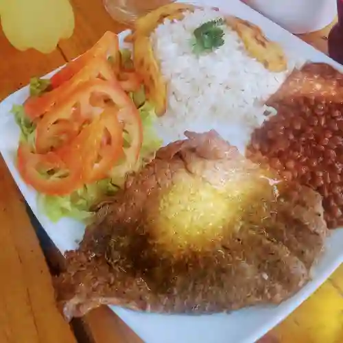 Bistecs Encebollado