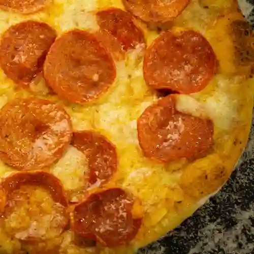 Porción de Pizza Pepperoni