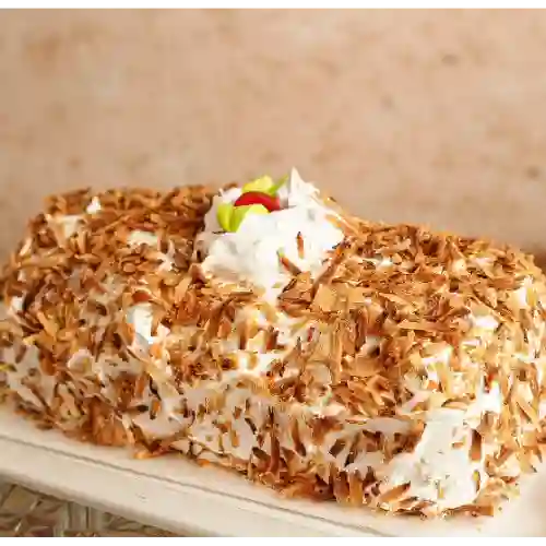 Rollo de Coco con Merengue 8p