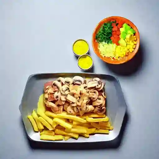 Baby beef con salsa de champiñones