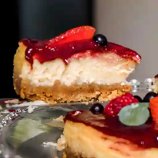 Porción Chessecake Frutos Rojos