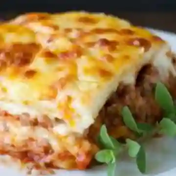 Lasaña Carne Maiz Tocineta + Francesa