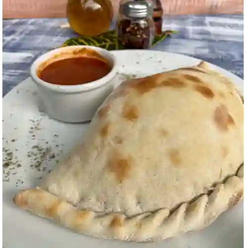 la de Prosciutto y Rúgula Calzone