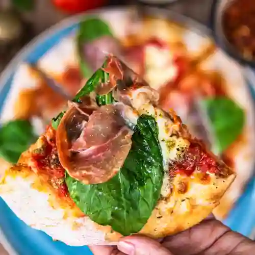 Pizza Prosciutto y Rugula