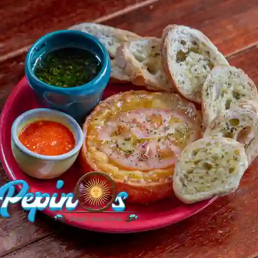 Provoleta con pan de ajo