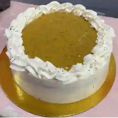 Porción torta de maracuyá y amapola