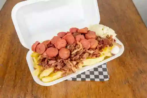 Salchipapa de Tocineta