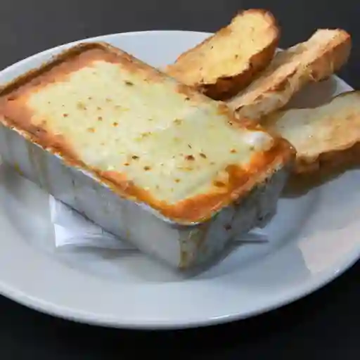 Lasagna con jamón y champiñones