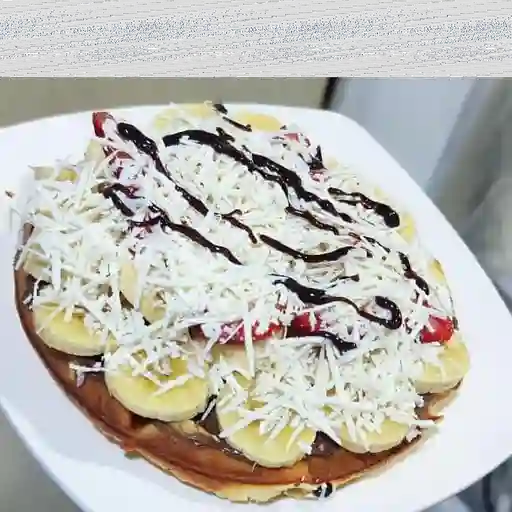 Waffle de arequipe, durazno y queso