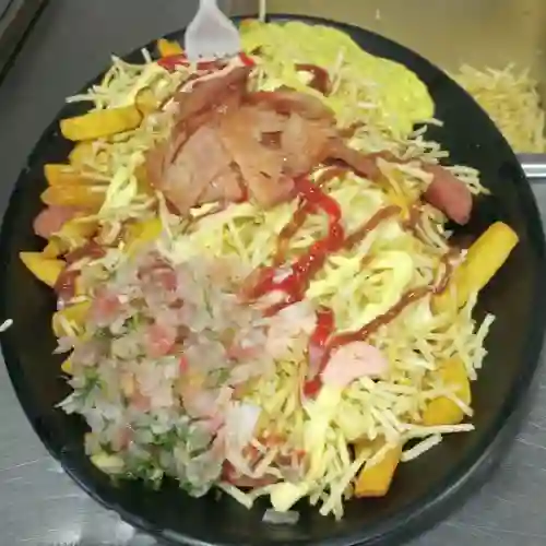 Salchipapa de la Casa