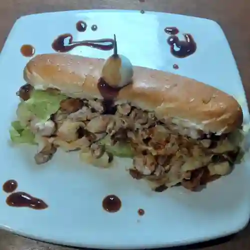 Sandwiche Cerdo y Pollo