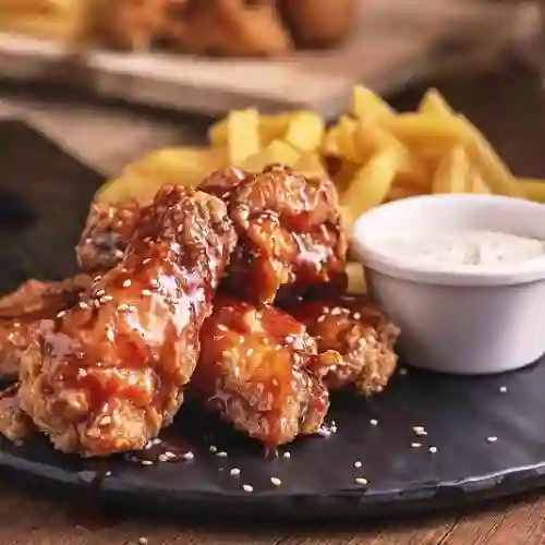 Alitas Prime en Salsa X 8 + Papas