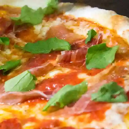 Pizza prosciutto e arugula