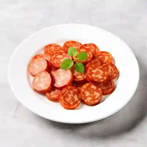 Adición de chorizo y butifarra