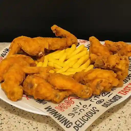 Alitas de pollo apanadas