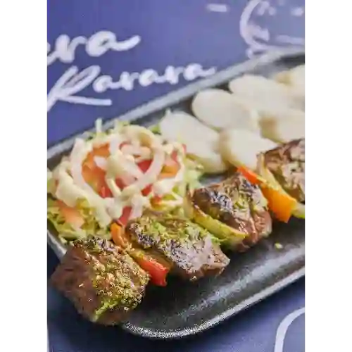 Chuzo en palito de carne
