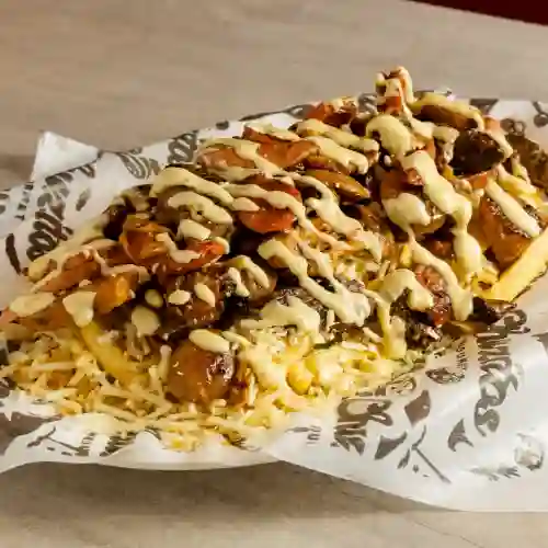 Salchipapa de la Casa