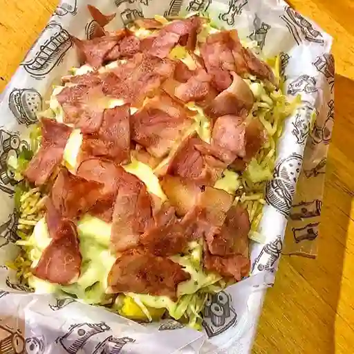 Salchipapa de Tocineta