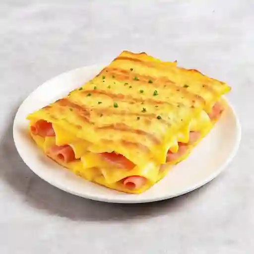 Tortilla de huevo con jamón y queso
