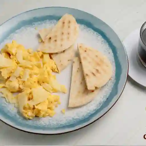 Huevos revueltos con queso