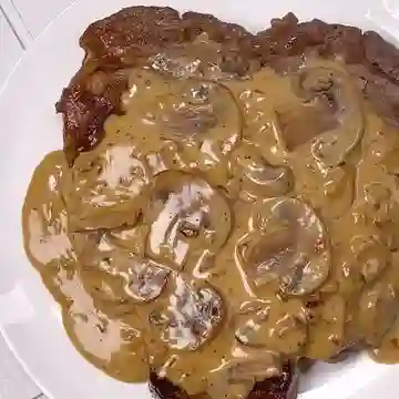 Lengua en salsa champiñones