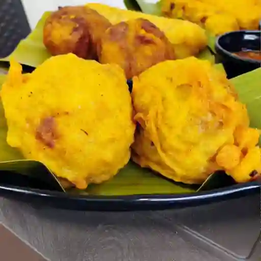 Papa rellena de carnes y arroz