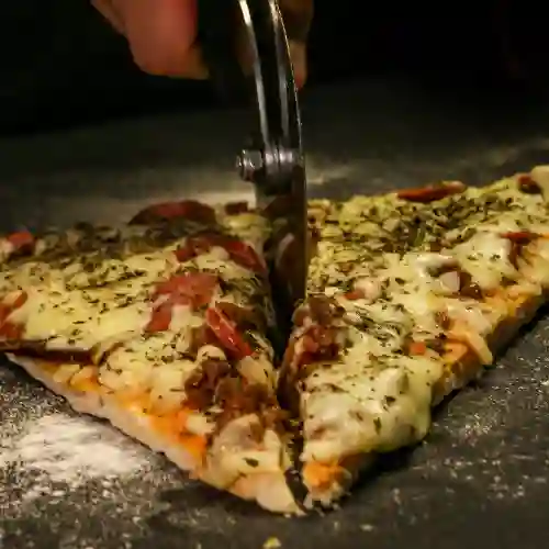 Porción Pizza Peperoni