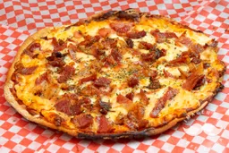 Pizza Tocino y Ciruelas