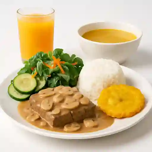 Res en Salsa de Champiñones