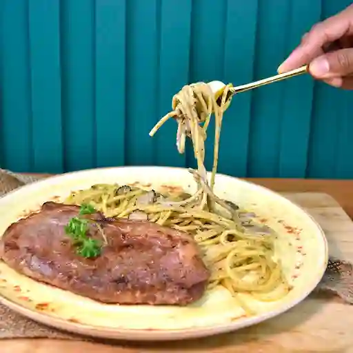 New York Steak Y Espaguetti Al Tartufo.