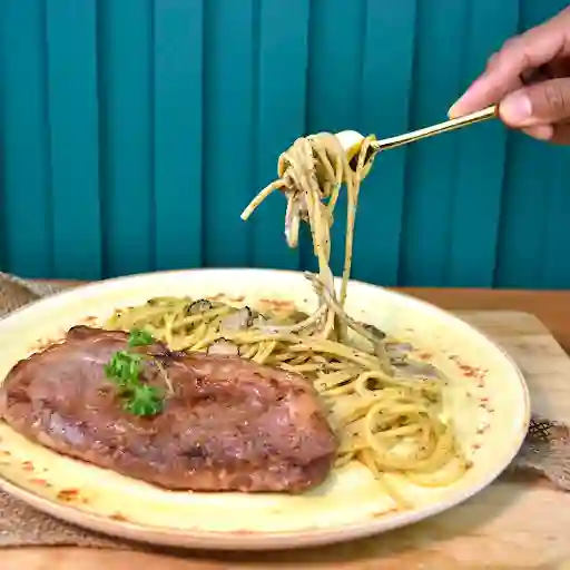New York Steak Y Espaguetti Al Tartufo.