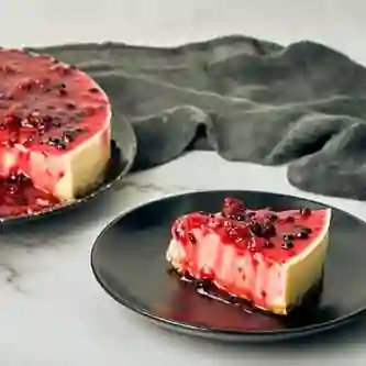 Por. Cheescake Frutos Rojos