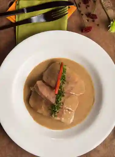 Lengua En Salsa De Carne