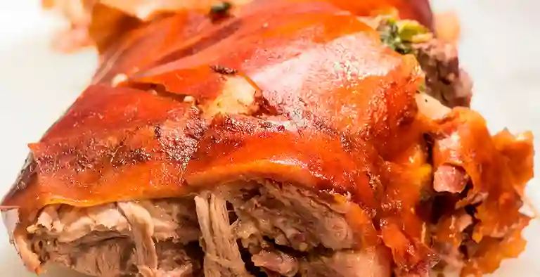 El Lechon Coyaimuno