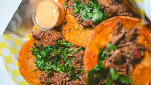 Burros Tacos Nachos By la Taqueria