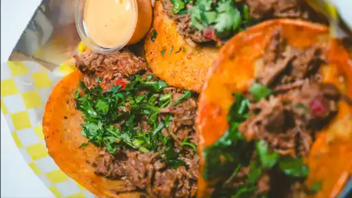Burros Tacos Nachos By la Taqueria