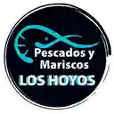 Pescados y Mariscos con los Hoyos - Barrios Unidos